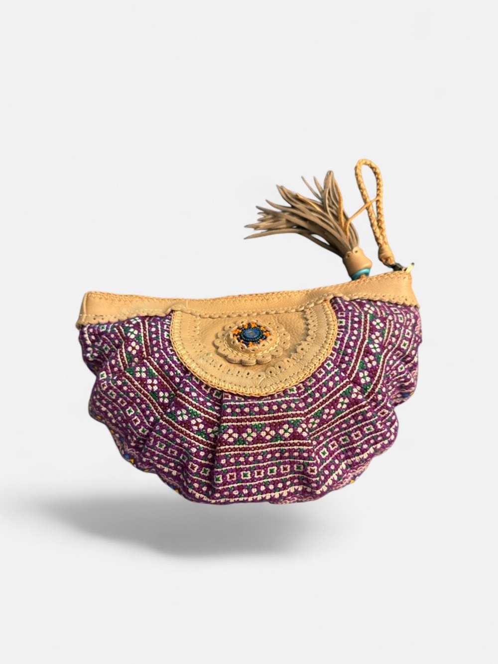 Purple Patterned Wristlet Clutch with Tan Trim and Tassel Accent